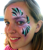 Pink and Teal Face Painting Eye Design